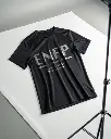 product-shot---black-t-shirt-at-studio (1).webp